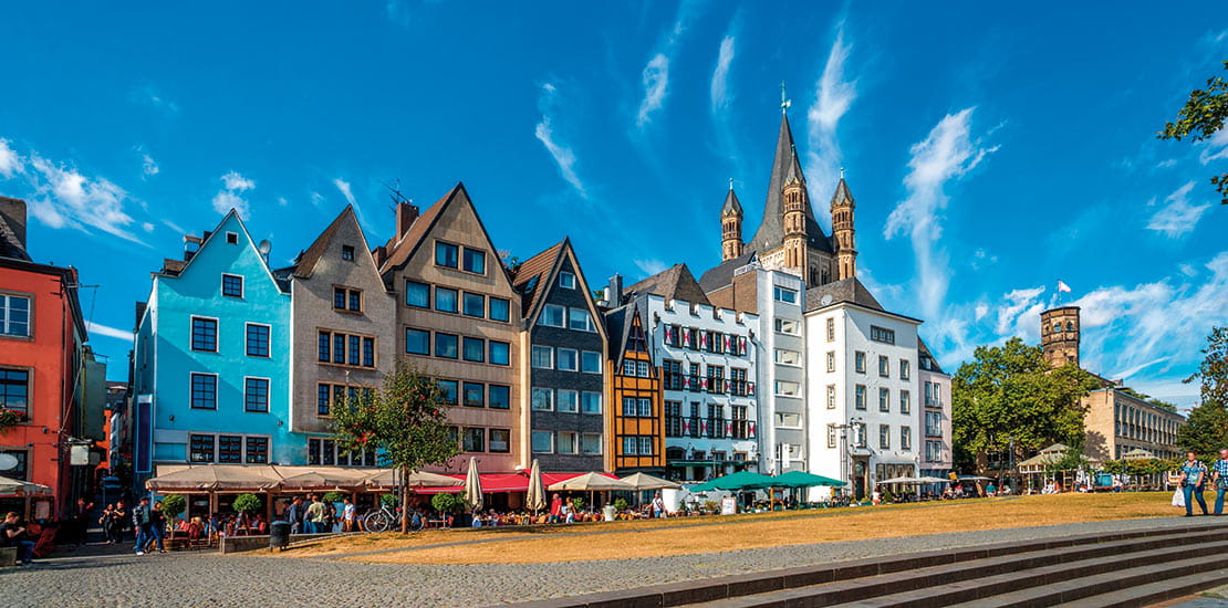 St Martin’s Church peeps over Cologne’s colourful houses